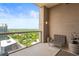 Cozy balcony seating area with stunning cityscape views at 2881 Peachtree Ne Rd # 2304, Atlanta, GA 30305