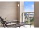 Outdoor balcony with metal lounge chairs and gorgeous views of the city at 2881 Peachtree Ne Rd # 2304, Atlanta, GA 30305