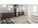 Spacious bathroom with double vanities, walk-in glass shower, and luxurious finishes at 2881 Peachtree Ne Rd # 2304, Atlanta, GA 30305