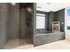 Luxurious bathroom featuring a tiled shower and a soaking tub for a spa-like experience at home at 2881 Peachtree Ne Rd # 2304, Atlanta, GA 30305