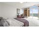 Bright bedroom featuring plush carpet, balcony access with great natural light and a lovely view at 2881 Peachtree Ne Rd # 2304, Atlanta, GA 30305