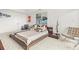 Bright bedroom featuring plush carpet, a modern bed frame, and stylish decorative art pieces at 2881 Peachtree Ne Rd # 2304, Atlanta, GA 30305