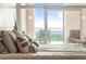 Bedroom with a balcony overlooking a scenic view, soft carpet, and decorative accents at 2881 Peachtree Ne Rd # 2304, Atlanta, GA 30305