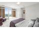 Bright bedroom featuring plush carpet, balcony access with great natural light and a lovely view at 2881 Peachtree Ne Rd # 2304, Atlanta, GA 30305