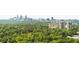Scenic Atlanta skyline view showcasing lush treetops and iconic buildings in the distance at 2881 Peachtree Ne Rd # 2304, Atlanta, GA 30305