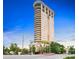 Stunning high-rise condominium showcasing private balconies and breathtaking city views under a clear sky at 2881 Peachtree Ne Rd # 2304, Atlanta, GA 30305
