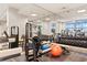 Well-equipped fitness center with weightlifting machines, mirrors, and exercise balls at 2881 Peachtree Ne Rd # 2304, Atlanta, GA 30305