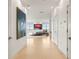Hallway leading to main bedroom, featuring neutral paint colors and art at 2881 Peachtree Ne Rd # 2304, Atlanta, GA 30305
