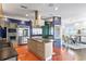 Spacious kitchen with stainless steel appliances, island cooktop, breakfast bar, and plenty of storage space at 2881 Peachtree Ne Rd # 2304, Atlanta, GA 30305