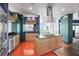 Gourmet kitchen with stainless steel appliances and a large center island with a cooktop and modern vent hood at 2881 Peachtree Ne Rd # 2304, Atlanta, GA 30305