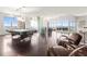 Spacious open-concept living area featuring wood floors, large windows and city views at 2881 Peachtree Ne Rd # 2304, Atlanta, GA 30305