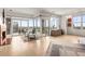 Living room with fireplace, large windows, and balcony access at 2881 Peachtree Ne Rd # 2304, Atlanta, GA 30305