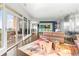 Bright living room featuring hardwood floors, a colorful rug, and floor to ceiling windows at 2881 Peachtree Ne Rd # 2304, Atlanta, GA 30305