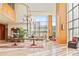 Spacious lobby featuring high ceilings, elegant decor, chandelier, and inviting seating areas at 2881 Peachtree Ne Rd # 2304, Atlanta, GA 30305