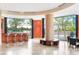 Modern club room features a sleek bar, stylish seating, and floor to ceiling windows at 2881 Peachtree Ne Rd # 2304, Atlanta, GA 30305