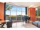 Bright lounge with a piano, floor-to-ceiling windows and a view of the outdoor balcony at 2881 Peachtree Ne Rd # 2304, Atlanta, GA 30305
