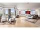Bright bedroom with large windows, desk, and accent wall art at 2881 Peachtree Ne Rd # 2304, Atlanta, GA 30305