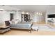 Spacious bedroom with a bed, bench, and lots of storage at 2881 Peachtree Ne Rd # 2304, Atlanta, GA 30305