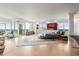 Bright, spacious bedroom featuring large windows and an open floor plan at 2881 Peachtree Ne Rd # 2304, Atlanta, GA 30305