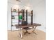 Contemporary office space features unique metal and wood shelving and sleek desk at 2881 Peachtree Ne Rd # 2304, Atlanta, GA 30305