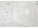 Luxurious marble walk-in shower with dual shower heads and built-in shelving at 2881 Peachtree Ne Rd # 2304, Atlanta, GA 30305
