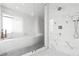 Luxurious bathroom with glass shower, marble walls and unique features at 2881 Peachtree Ne Rd # 2304, Atlanta, GA 30305