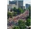 View overlooking the city street with a crowd of runners in a marathon at 2881 Peachtree Ne Rd # 2304, Atlanta, GA 30305