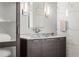 Contemporary bathroom vanity with marble countertop and stylish lighting at 2881 Peachtree Ne Rd # 2304, Atlanta, GA 30305