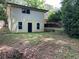 View of the backyard featuring a house and deck at 2981 Judylyn Dr, Decatur, GA 30033