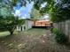 A backyard view featuring a wooden deck with an above ground basement at 2981 Judylyn Dr, Decatur, GA 30033