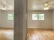 View of connecting bedrooms with hardwood floors, ceiling fans and natural light at 2981 Judylyn Dr, Decatur, GA 30033