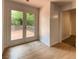 Dining area with access to a wooden deck through glass doors and view of trees at 2981 Judylyn Dr, Decatur, GA 30033