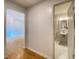 Bright hallway with hardwood floors and an open view of a bathroom at 2981 Judylyn Dr, Decatur, GA 30033