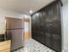 Spacious kitchen featuring dark wood cabinets and stainless steel refrigerator at 2981 Judylyn Dr, Decatur, GA 30033