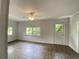 Bright sun room with tile flooring, neutral paint, and multiple windows at 2981 Judylyn Dr, Decatur, GA 30033