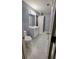 Bathroom featuring a white vanity, a toilet, and tiled floors at 303 Sedgewick Trl, Lawrenceville, GA 30044