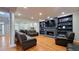 Open concept Living Room with wood floors and neutral paint at 303 Sedgewick Trl, Lawrenceville, GA 30044