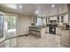 Bright eat-in kitchen with ample counter space, granite countertops, and island with seating at 3285 Long Iron Pl, Lawrenceville, GA 30044