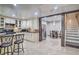 Spacious open concept kitchen and dining area with stairs to a lower level at 3285 Long Iron Pl, Lawrenceville, GA 30044