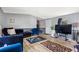 The cozy living room features sleek flooring, grey walls, and ample natural light at 101 Olympic Ct, Fayetteville, GA 30214