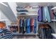 Walk-in closet with organized shelving and hanging racks for clothes and accessories at 287 West Wind Dr, Lilburn, GA 30047