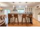 Stylish kitchen with stainless appliances, island seating, and pendant lighting, perfect for entertaining at 287 West Wind Dr, Lilburn, GA 30047