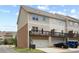 Townhouse rear exteriors showing garages, decks and parking at 4181 Integrity Way, Powder Springs, GA 30127