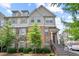 Charming townhome with a blend of stone, brick, and siding for a unique and inviting curb appeal at 4181 Integrity Way, Powder Springs, GA 30127