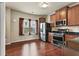 Well-equipped kitchen featuring stainless steel appliances, granite countertops, and ample cabinet space at 4181 Integrity Way, Powder Springs, GA 30127