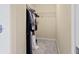 Walk in closet with some clothing hung and shelving at 4181 Integrity Way, Powder Springs, GA 30127