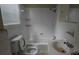 Basic bathroom featuring standard fixtures and a tiled tub/shower combination at 1516 Carter Rd, Decatur, GA 30032