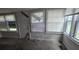 Sunroom with multiple windows offering ample natural light and a view of the surroundings at 1516 Carter Rd, Decatur, GA 30032