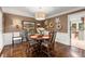 Elegant dining room with hardwood floors, decorative accents, and natural light at 1582 E Bank Dr, Marietta, GA 30068