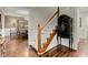 Elegant staircase featuring hardwood floors, and decor throughout at 1582 E Bank Dr, Marietta, GA 30068